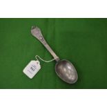A pewter spoon.