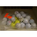 A bag of assorted golf balls.
