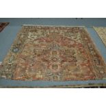 A Persian carpet, cream ground with stylised decoration (reduced in length) 205cm x 220cm.