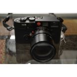 A Leica M6 camera and lens.