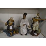 Three Chinese sancai glazed figures.