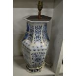 A Chinese blue and white lamp vase.