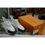 Louis Vuitton, a pair of Christian Lady trainers, size 43, appear unworn in original box.