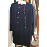Chanel, a ladies navy blue classic dress with red trim and Chanel gilt buttons, approximate size