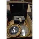 A small gilt framed convex mirror, circular gilt framed engraving, an old leather box and a