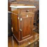 A Victorian mahogany pot cupboard with marble top.