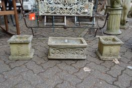 Three garden planters.