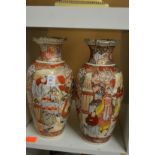 A pair of Satsuma vases (rims damaged).