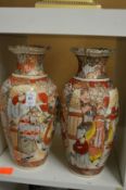 A pair of Satsuma vases (rims damaged).