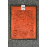 An unusual Indian or Tibetan relief moulded plaque.