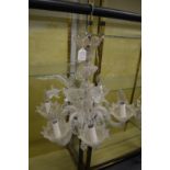 A Venetian glass six branch chandelier.