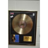 Phil Collins, Hello I Must Be Going, a limited edition gold disc no 5 of 50, framed glazed.