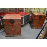 A pair of Chinese dragon decorated red lacquer storage chests.