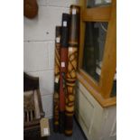 Three various didgeridoo's.