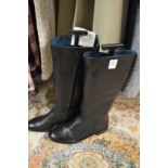 A pair of ladies Clarks black leather boots size 6.