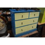 A painted pine chest of drawers.