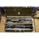 A cased clarinet.