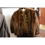 A mink jacket and a full length fur coat.