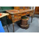 A French mahogany and ormolu mounted writing table.