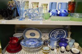 Two shelves of decorative and household china and glass.