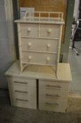 A faux bamboo white lacquer small chest of drawers and a pair of modern three drawer bedside