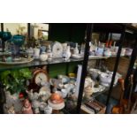 Two large shelves of decorative and household china and glass etc.