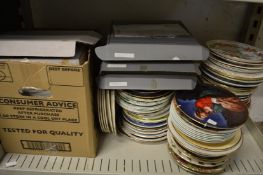 A large collection of collectors plates etc.