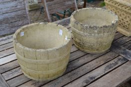 A pair of garden plant pots.