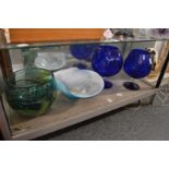 A large art glass bowl signed Siddy Langley 2002, together with another stylish glass bowl and a