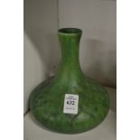 A Royal Lancastrian green mottle glazed squat shaped vase.