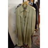 A Burberrys gentlemans trench coat, size 54 regular.
