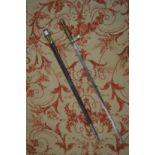 An early 19th century sword and scabbard, possibly made for theatrical use.