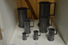 A graduated set of seven Continental pewter measures.
