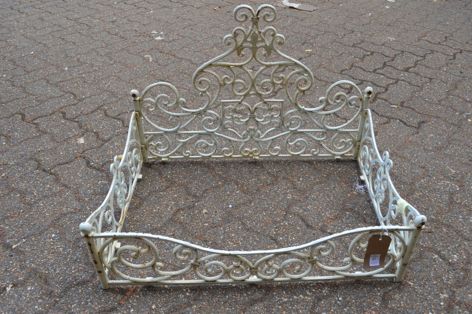 An ornate cast iron frame.