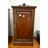 A walnut pot cupboard.