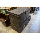 Two tin trunks, one containing trolley jack and accessories.