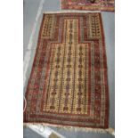 A Persian prayer rug 153cm x 90cm.