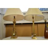 Two brass column style lamps.