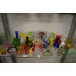 A good collection of coloured glassware to include cranberry beakers, Loetz style bowls and other