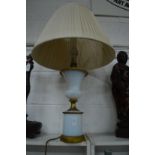 An ormolu and opalescent glass urn shaped lamp.