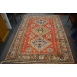 A good Persian design carpet, red ground with stylised decoration 245cm x 176cm.