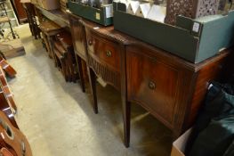 A mahogany sideboard.