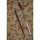 An early 19th century sword and scabbard, possibly made for theatrical use.