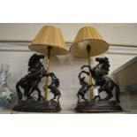 A pair of Spelter Marley Horse table lamps.