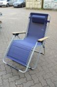 A modern folding reclining garden lounger.