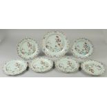 A SET OF SIX CHINESE QIANLONG FAMILLE ROSE PORCELAIN PLATES, together with a larger plate, each