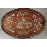 A VERY FINE CHINESE MOTHER OF PEARL INLAID HARDWOOD OVAL TRAY, beautifully decorated with central