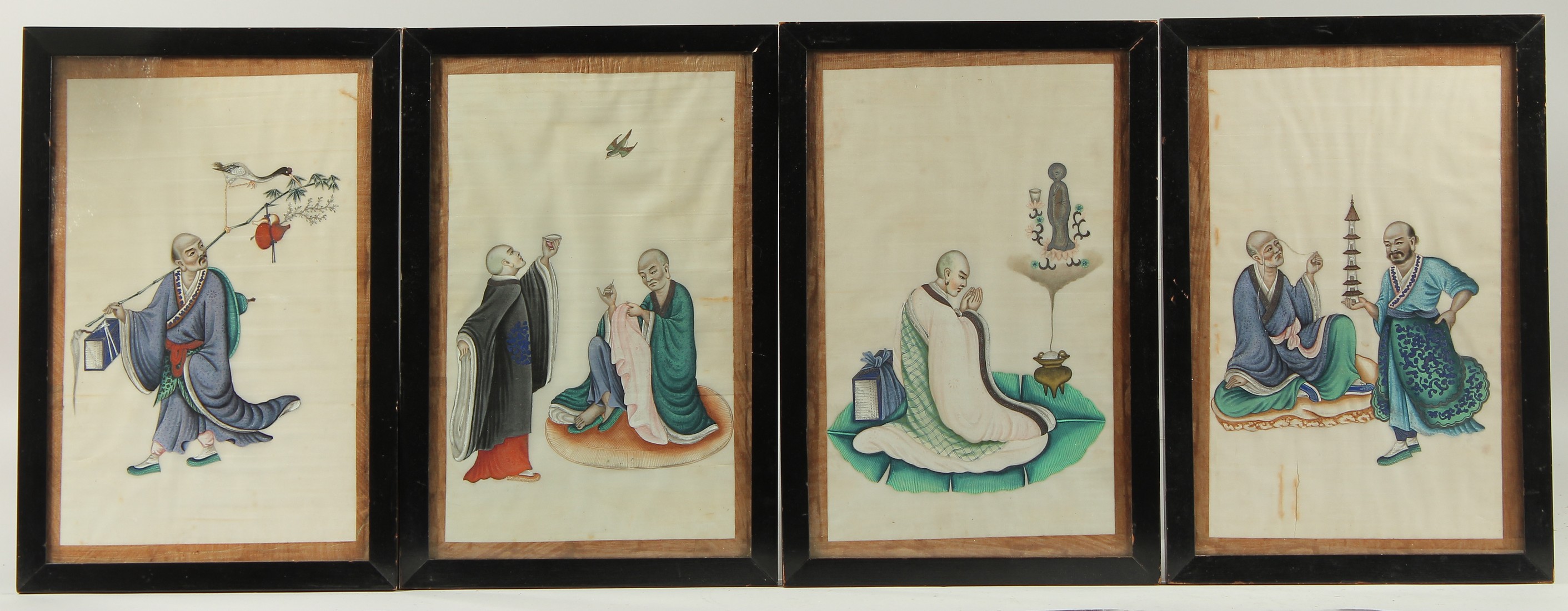FOUR CHINESE PITH PAINTINGS, depicting various figures, uniformly framed and glazed, 38.5cm x 26cm