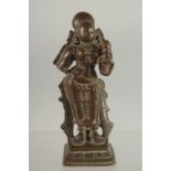 A 17TH CENTURY SOUTH INDIAN BRONZE HINDU DEITY, 9cm high.