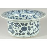 A CHINESE BLUE AND WHITE PORCELAIN WATER BASIN, the interior painted with auspicious symbols and